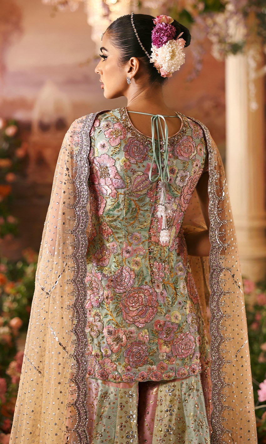 Rosebud pakistani fashion outfit with coordinated formal styling.