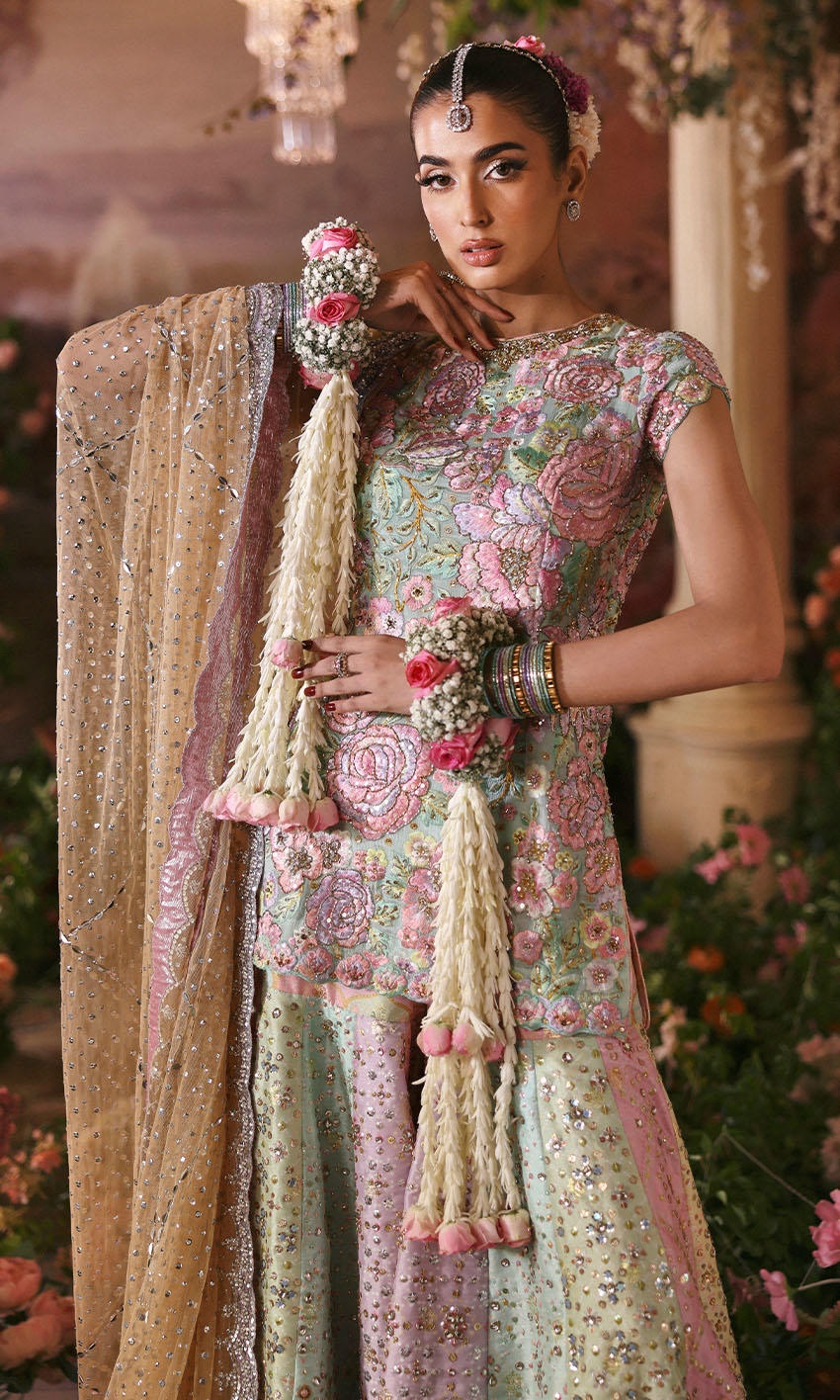 Rosebud pakistani fashion outfit with coordinated formal styling.