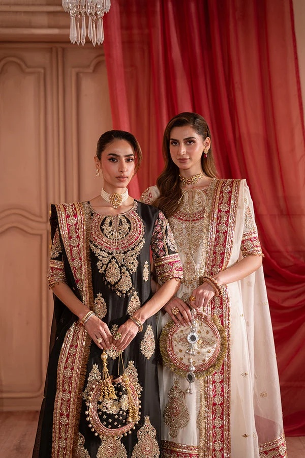 SOLARA Pakistani fashion outfit in gold, pink, red tones.
