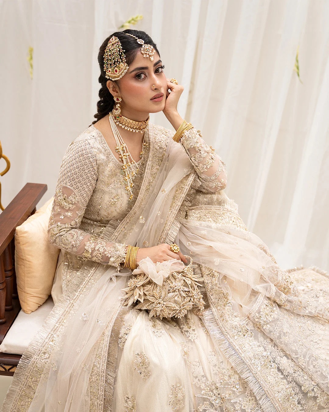 Safak Pakistani fashion outfit in ivory, gold tones.