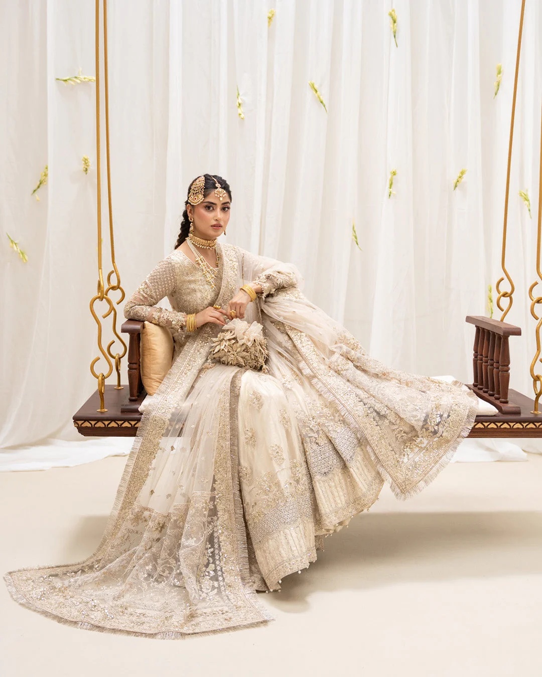 Safak Pakistani fashion outfit in ivory, gold tones.