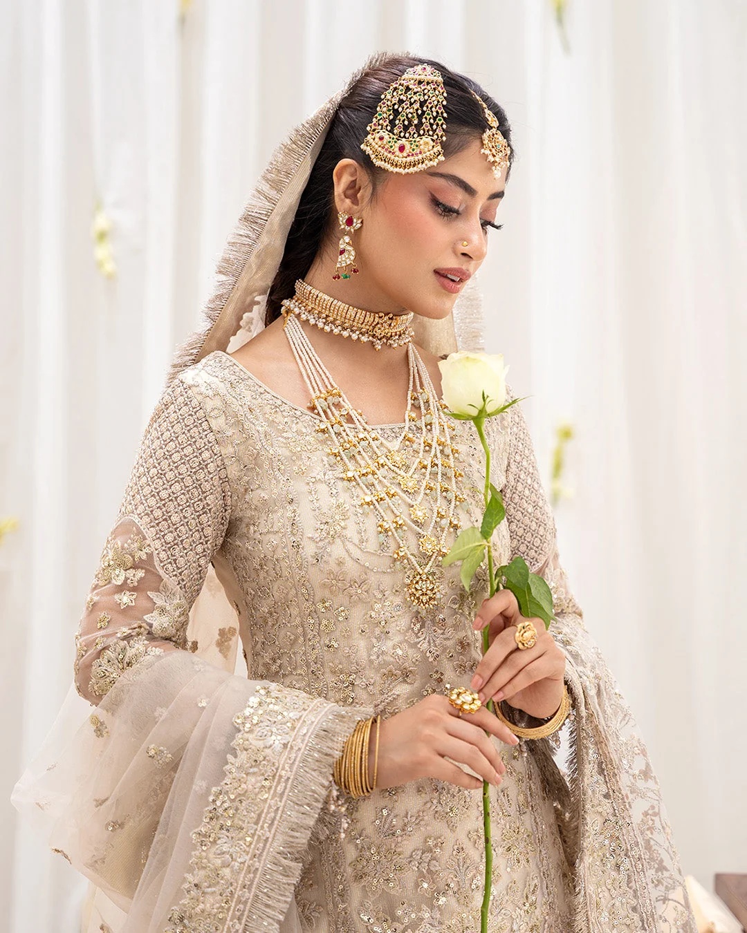 Safak Pakistani fashion outfit in ivory, gold tones.