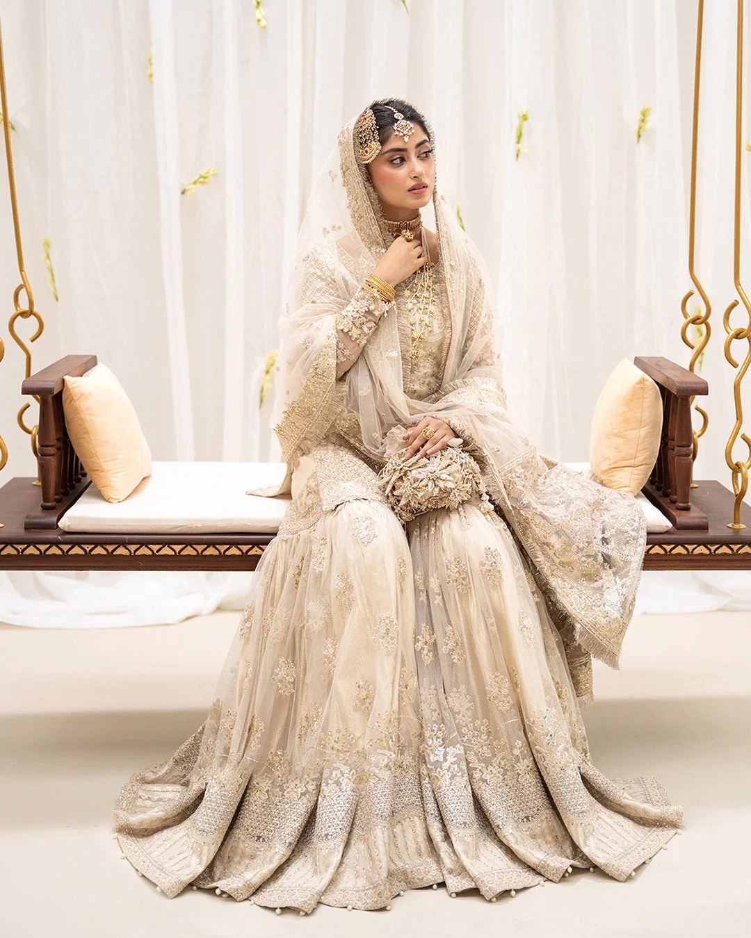 Safak Pakistani fashion outfit in ivory, gold tones.