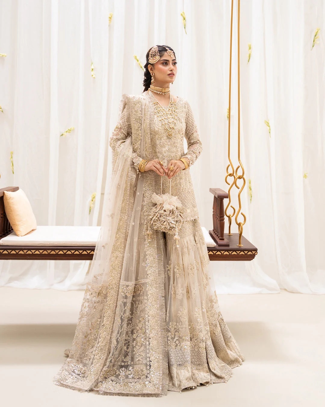 Safak Pakistani fashion outfit in ivory, gold tones.