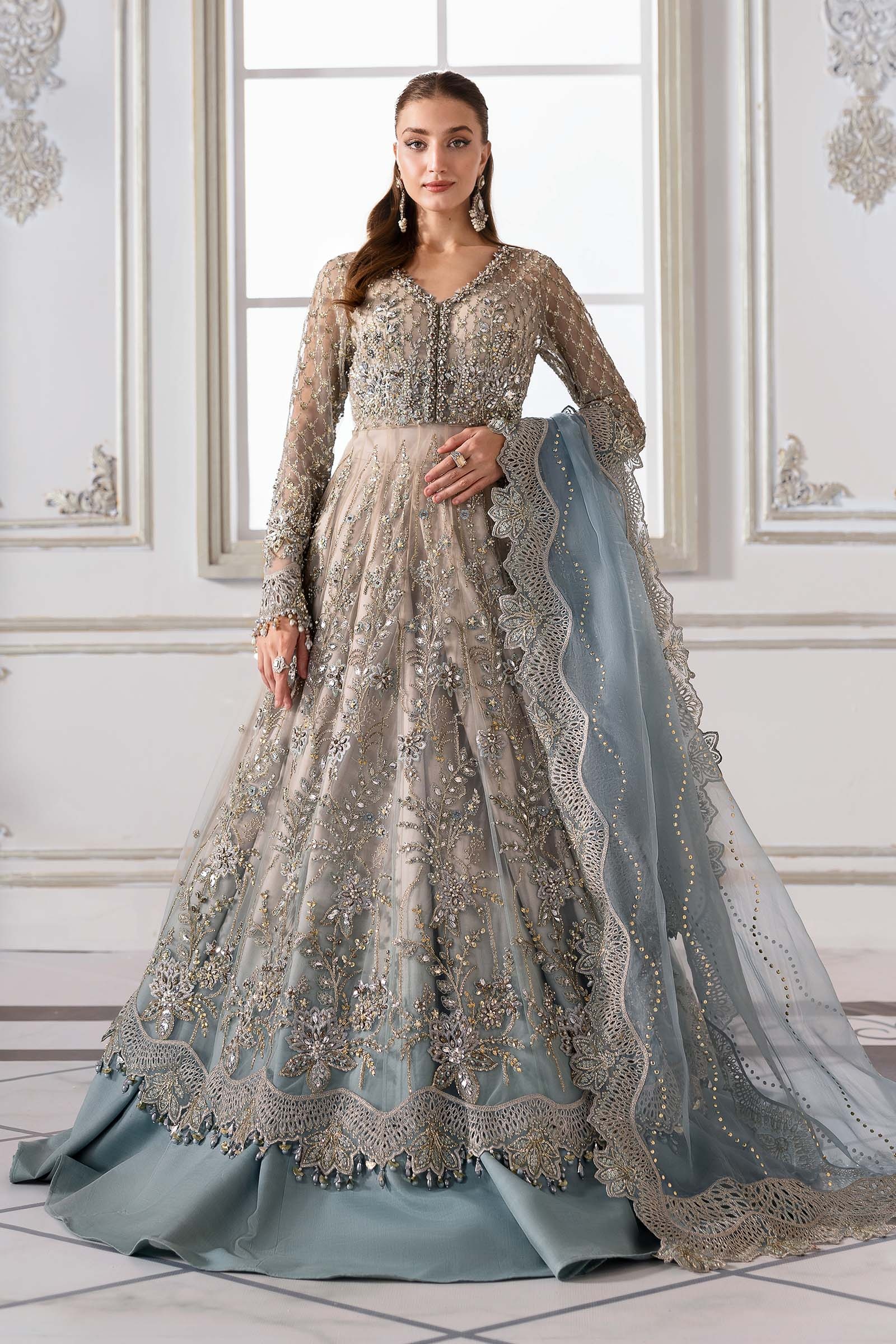 Serene pakistani fashion outfit with coordinated formal styling.