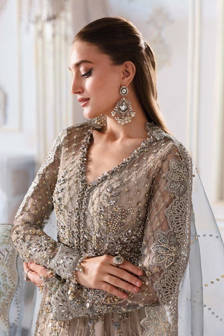 Serene pakistani fashion outfit with coordinated formal styling.