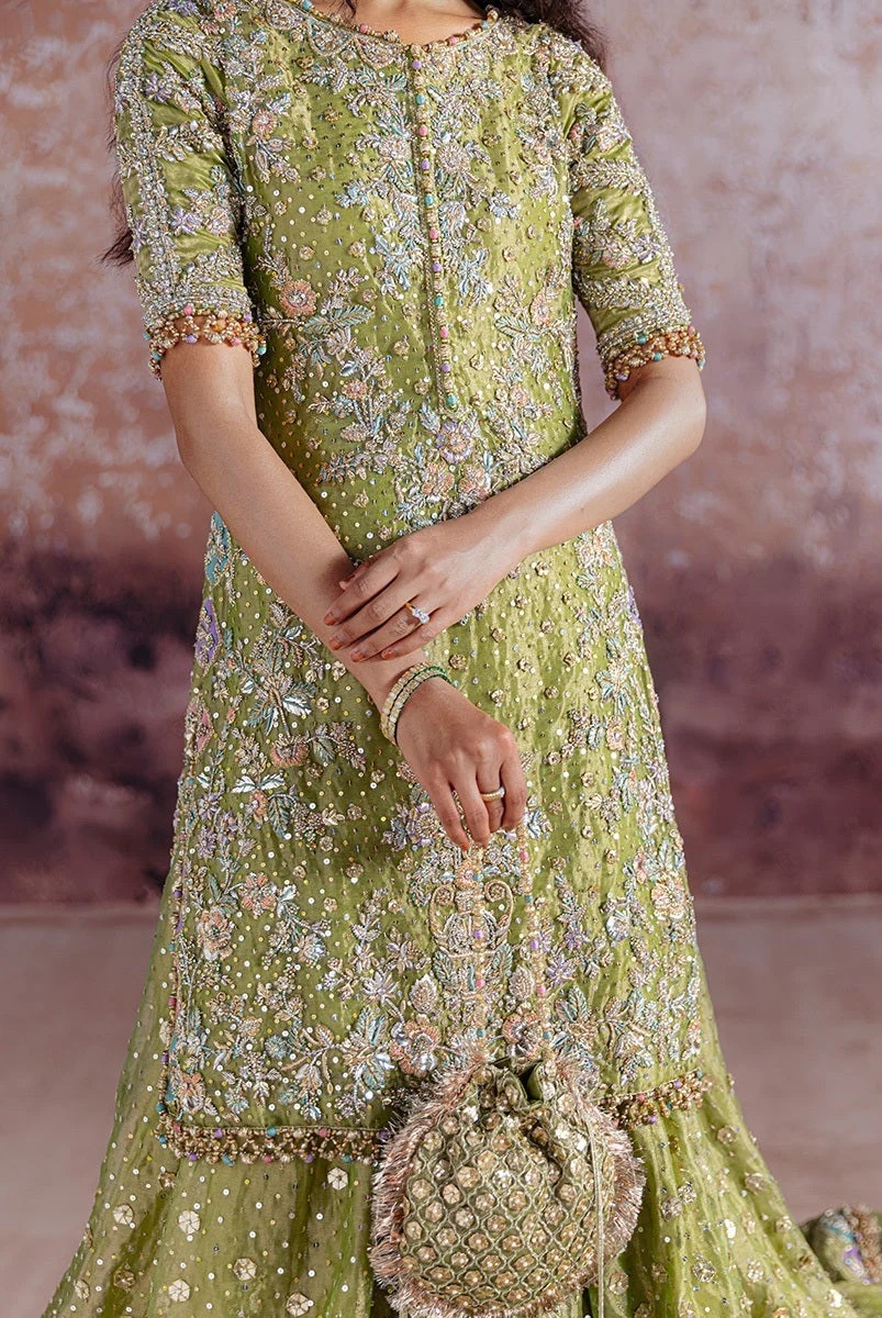 Shadan pakistani fashion outfit with coordinated formal styling.