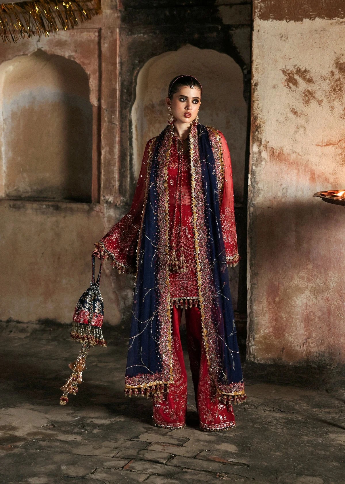 Shahrbano Pakistani fashion outfit in red tones.