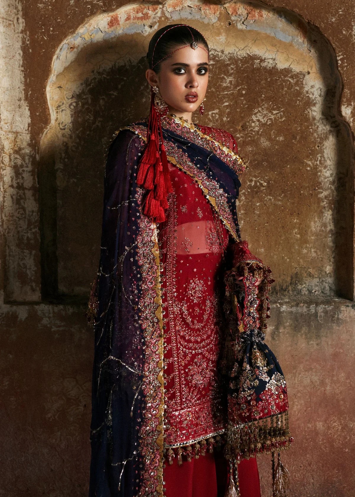 Shahrbano Pakistani fashion outfit in red tones.