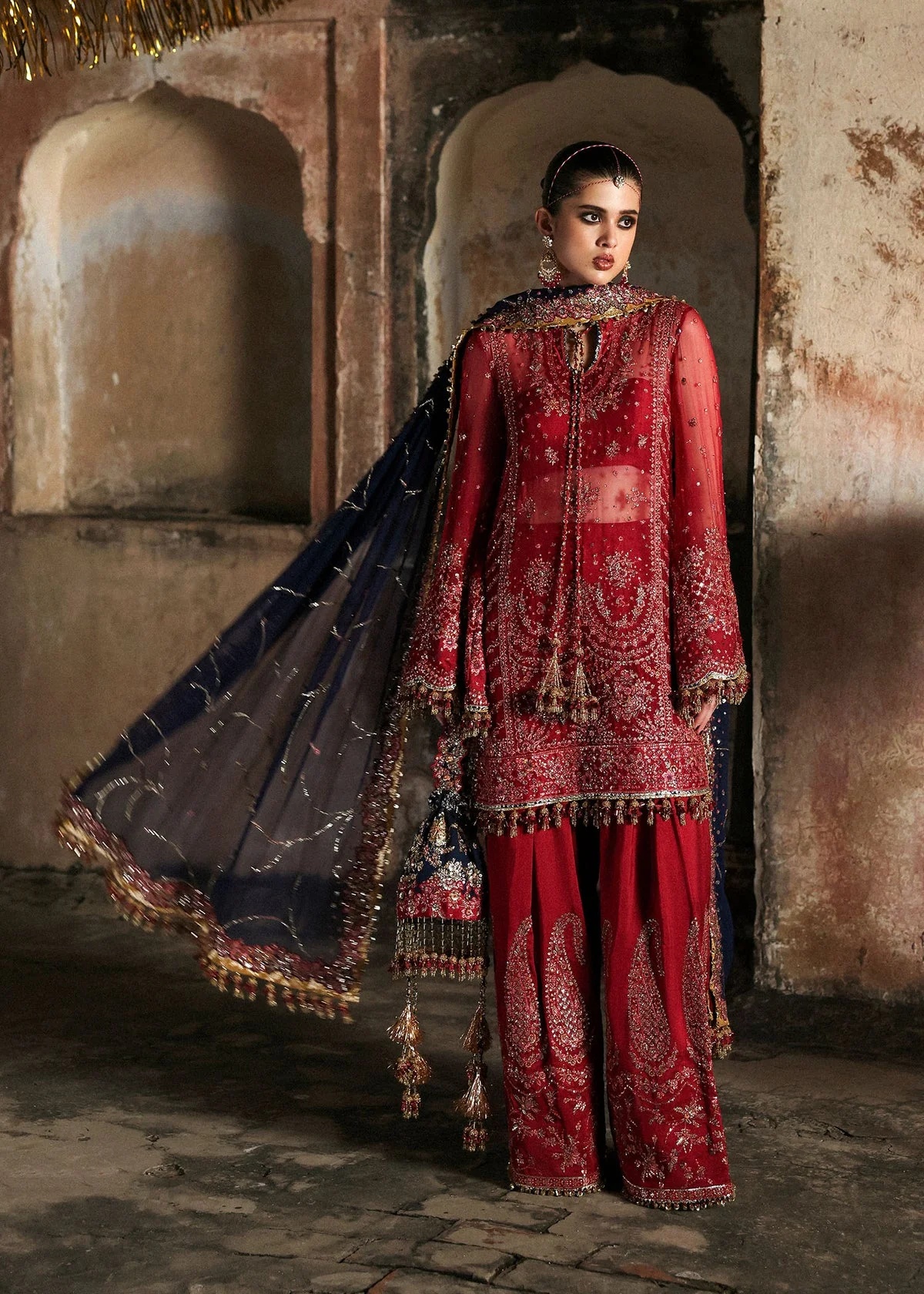 Shahrbano Pakistani fashion outfit in red tones.