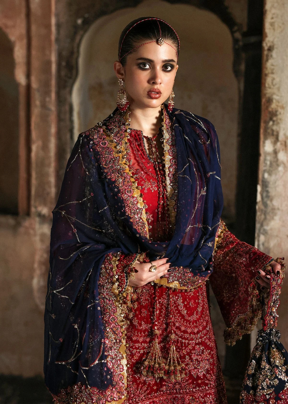 Shahrbano Pakistani fashion outfit in red tones.
