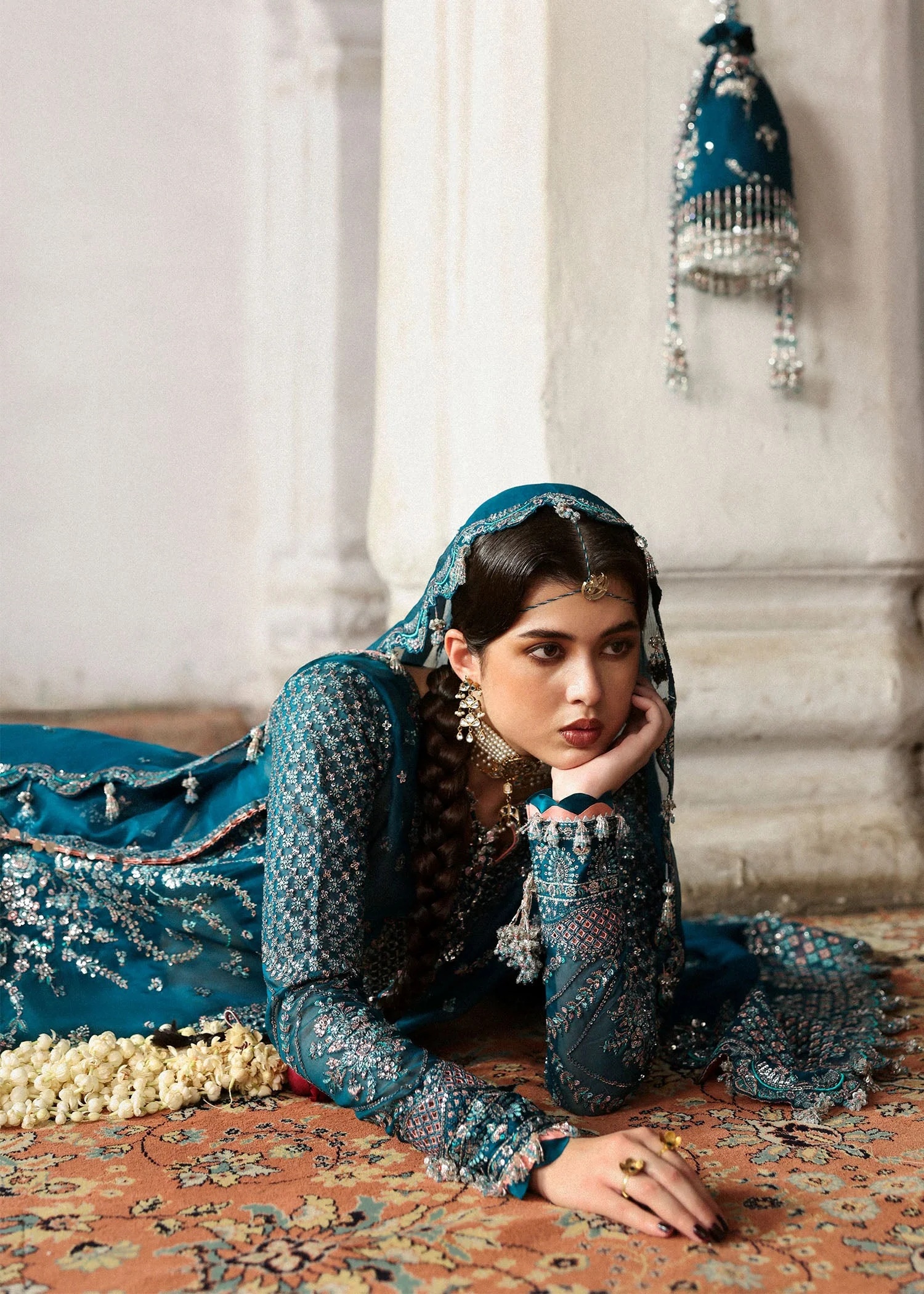 Zebunisa Pakistani fashion outfit in teal tones.