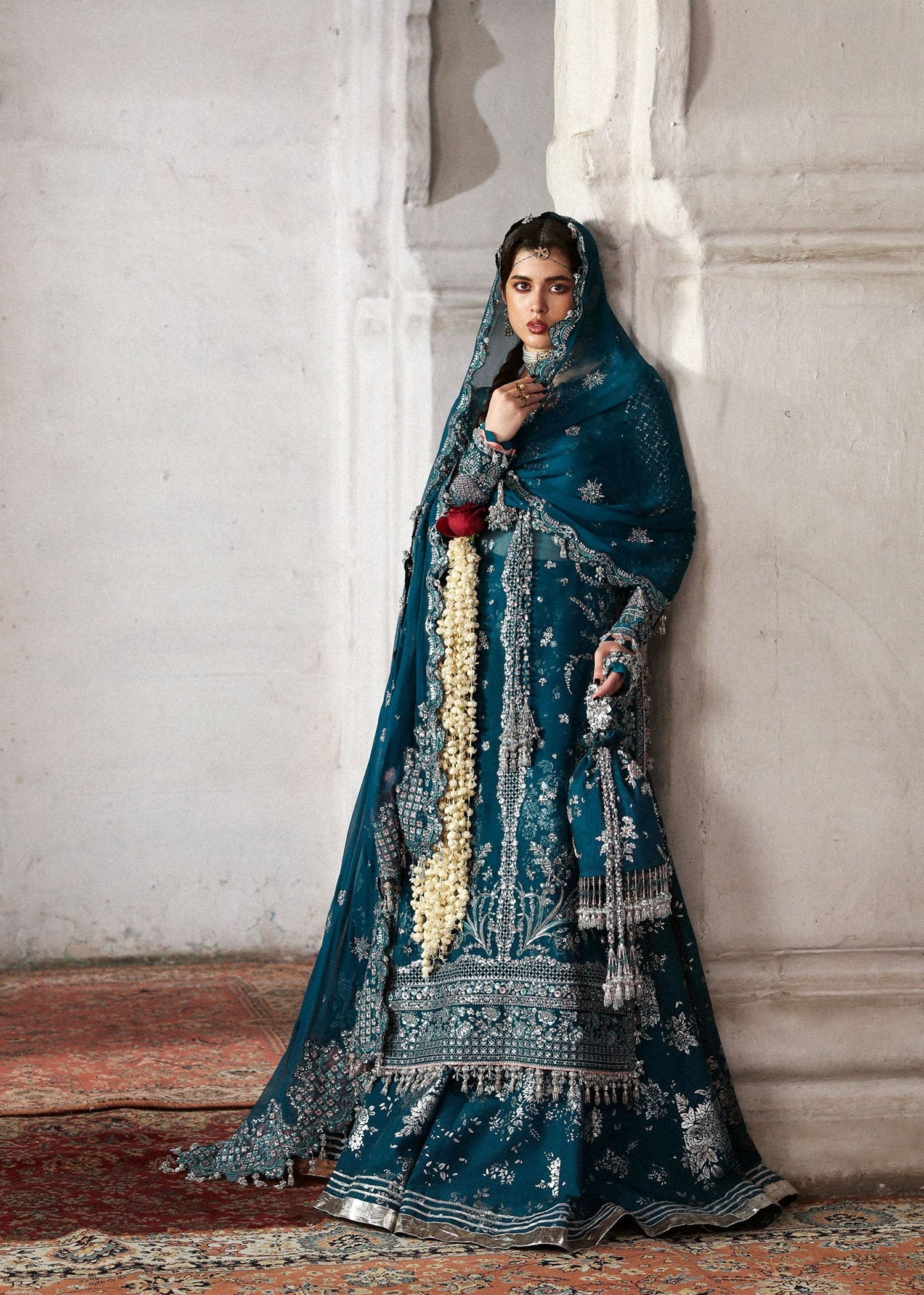 Zebunisa Pakistani fashion outfit in teal tones.