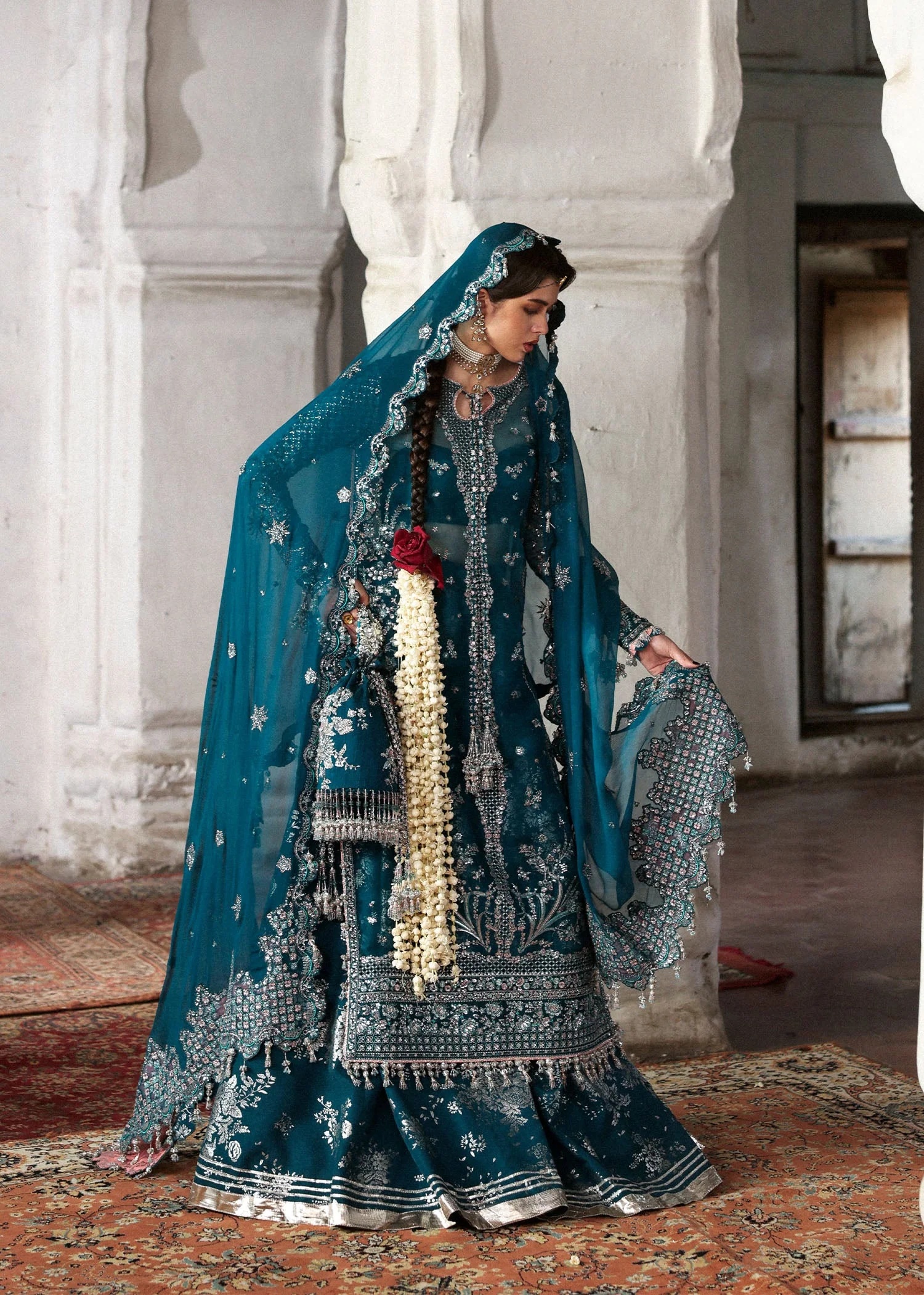 Zebunisa Pakistani fashion outfit in teal tones.