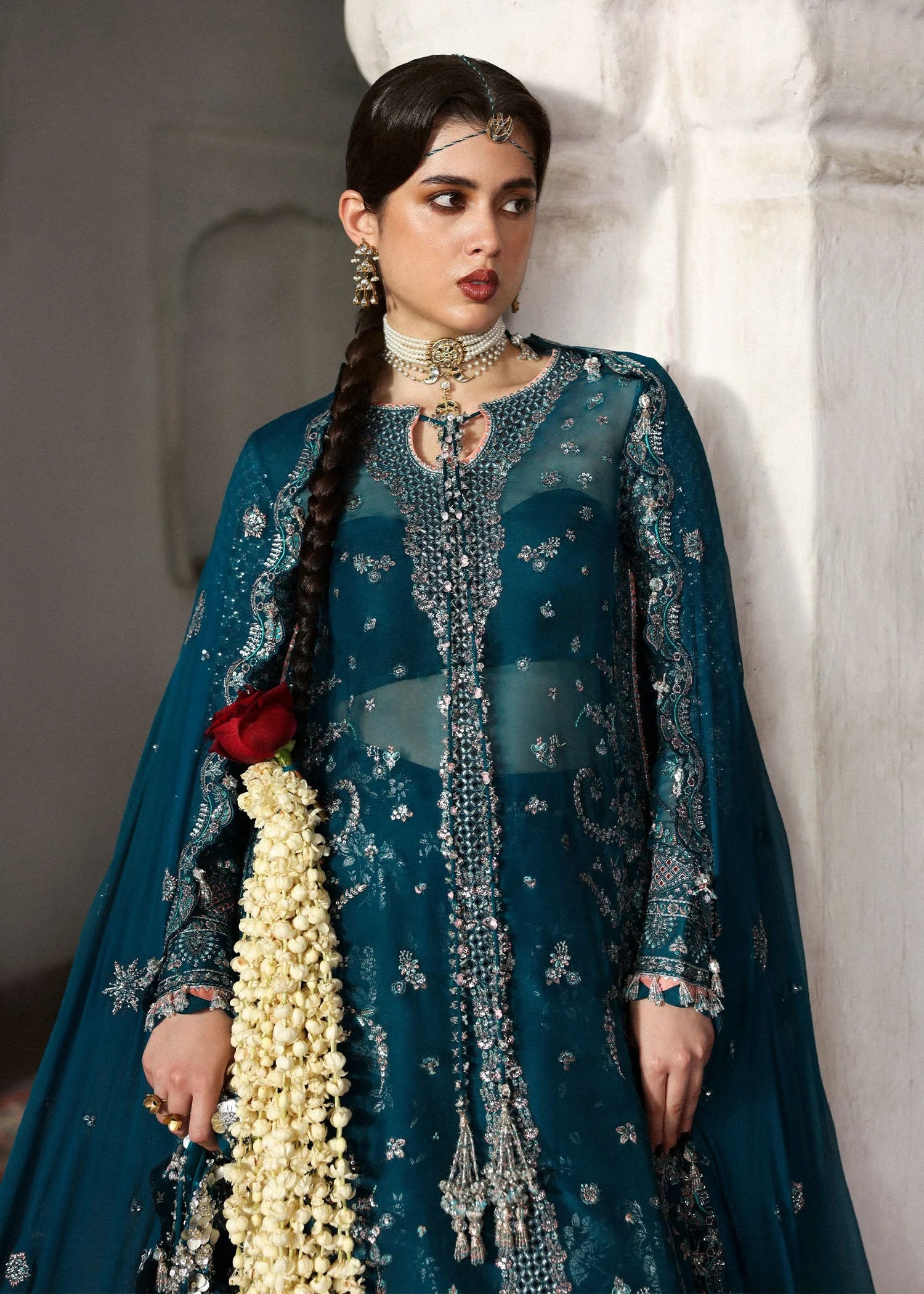 Zebunisa Pakistani fashion outfit in teal tones.