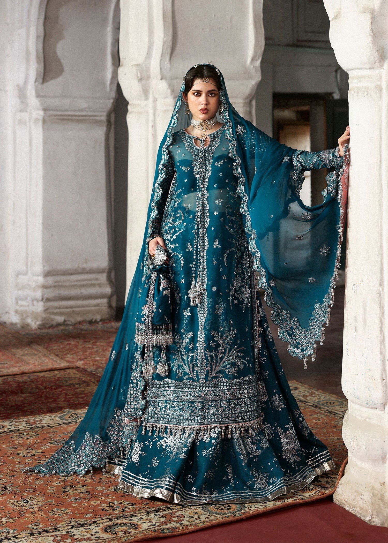 Zebunisa Pakistani fashion outfit in teal tones.