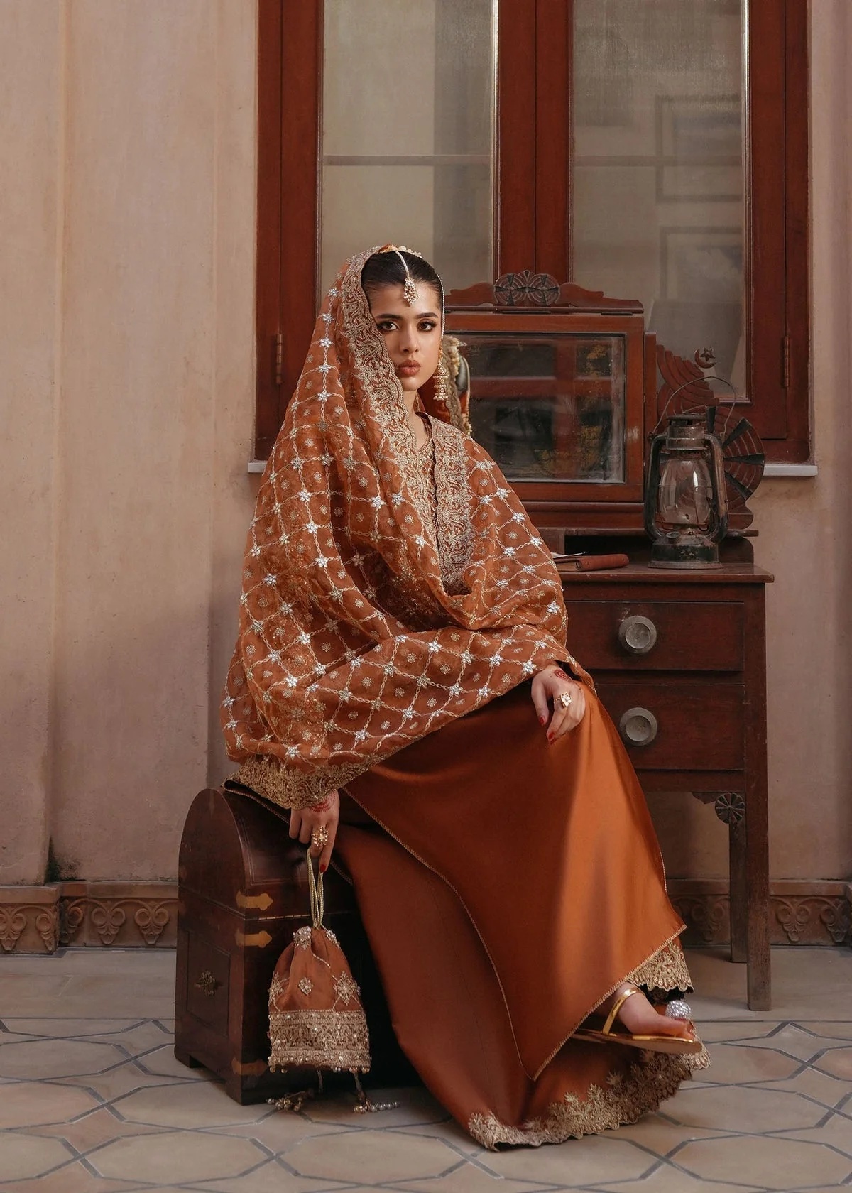 Zulekha pakistani fashion outfit with coordinated formal styling.